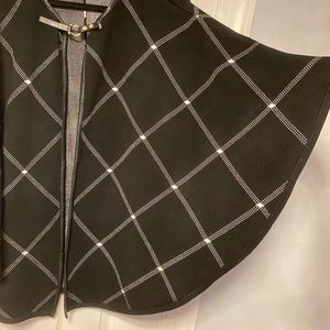 Black cape with white pattern